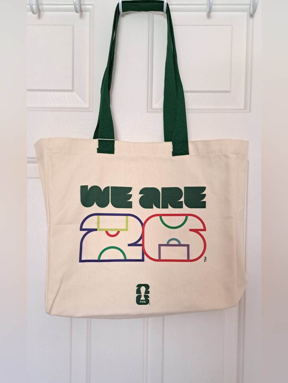 Canvas Tote Bag with Dark Green Handles and 'We Are 26' Graphic